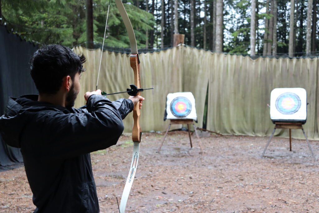archer in forest target practice